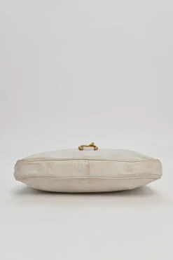 Ivory aged leather snap hook shoulder bag with gold-tone metallic hardware