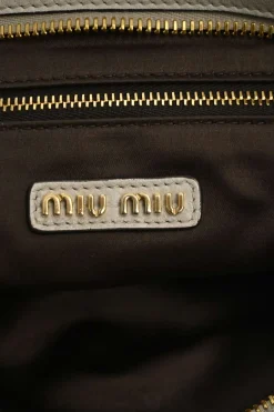 Ivory aged leather snap hook shoulder bag with gold-tone metallic hardware