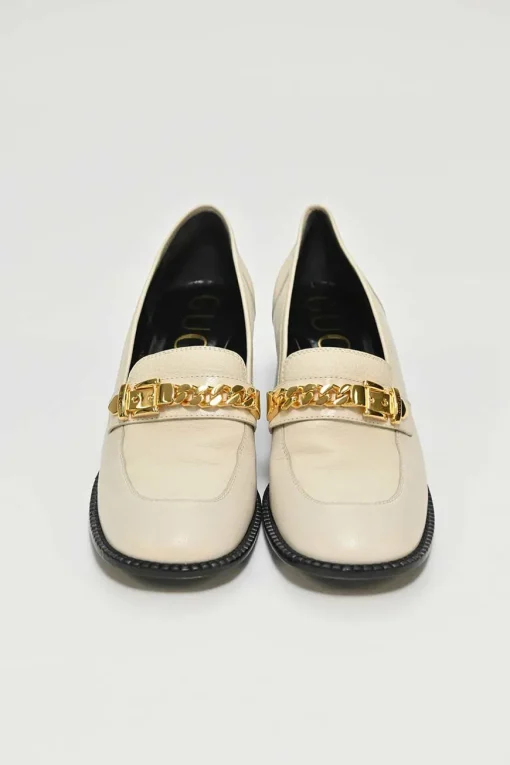 Ivory and black grained calfskin square-toe block heel chain detail loafers