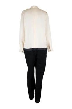 Ivory and black wool drop waist band collar button down blouse and tuxedo trouser paneled jumpsuit