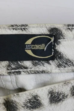 Ivory and espresso cotton-blend denim low-rise flared jeans with waist adjuster featuring cheetah digi-print