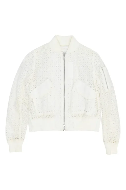 Ivory cotton broderie Anglaise peek-a-book zip-up bomber jacket with ribbed collar, cuffs, and hem