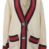 Ivory cotton-blend bouclé knit cardigan featuring webbing grosgrain inserts and crystal shank buttons