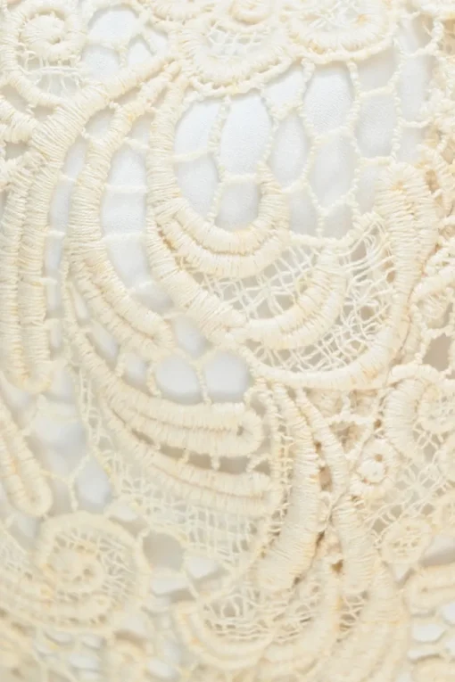 Ivory cotton-blend guipure lace illusion mini skirt with scalloped hem