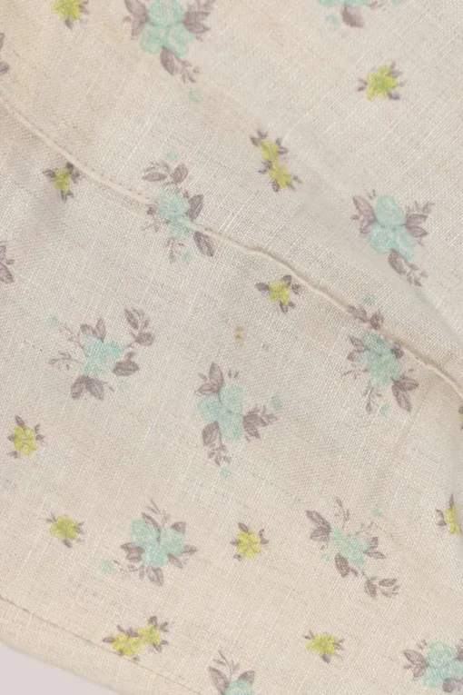 Ivory ditsy floral print pull-on high-rise flared pants