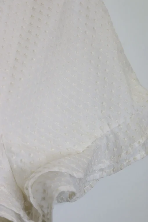 Ivory lattice-embroidered polyester high-rise mini ruffle shorts