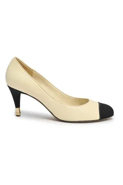 Ivory leather and grosgrain round-toe mid-heel pumps with contrast cap toe