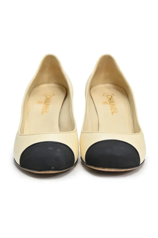Ivory leather and grosgrain round-toe mid-heel pumps with contrast cap toe