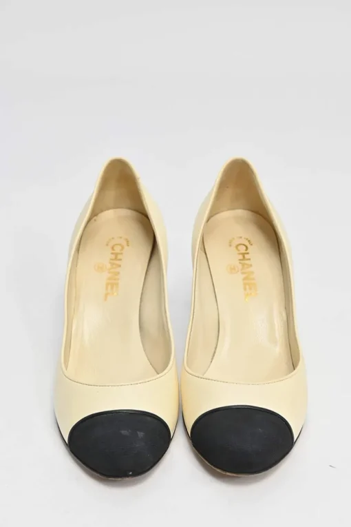 Ivory leather and grosgrain round-toe mid-heel pumps with contrast cap toe