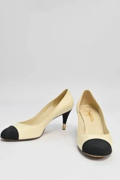Ivory leather and grosgrain round-toe mid-heel pumps with contrast cap toe