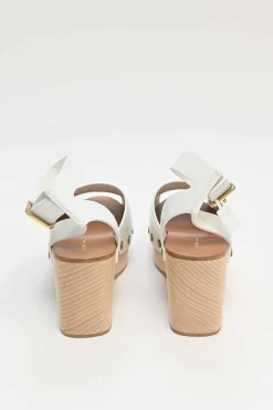 Ivory leather and wood studded platform clog sandals with buckle strap fastening
