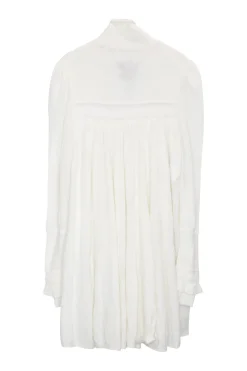 Ivory polyamide-blend fully-fashioned lace-up funnel neck empire waist tunic top with tiered puff sleeves