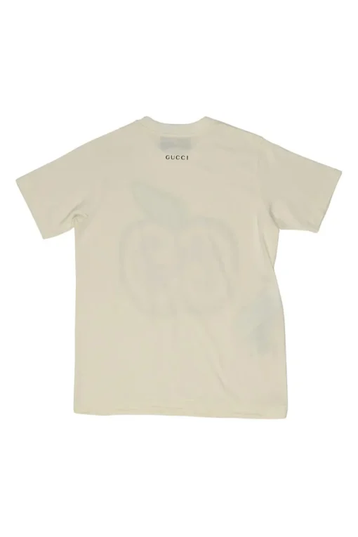 Ivory screen-printed cotton jersey crewneck pullover T-shirt featuring GG apple motif at centre front