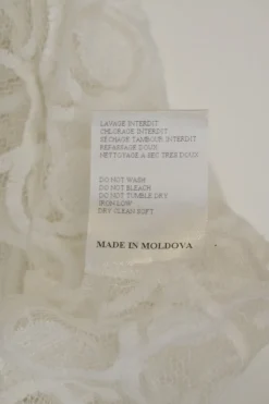 Ivory semi-sheer polyester guipure lace peek-a-boo oversized T-shirt and knee-length skirt set