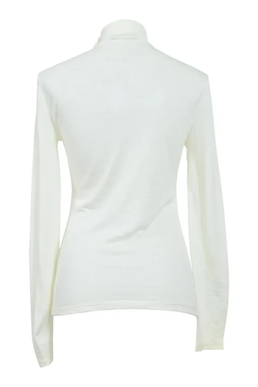 Ivory semi-sheer wool interlock jersey funnel collar pullover long sleeve top with coat of arms shoulder line shank button appliqué