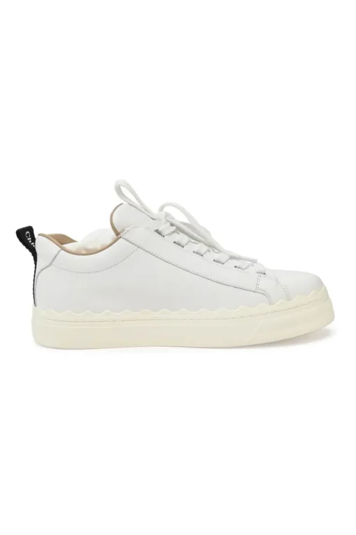 Ivory white calfskin and rubber low-top Lauren sneakers with scalloped sole motif