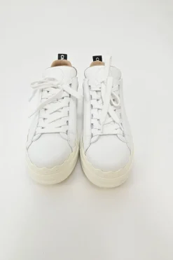 Ivory white calfskin and rubber low-top Lauren sneakers with scalloped sole motif