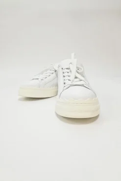 Ivory white calfskin and rubber low-top Lauren sneakers with scalloped sole motif