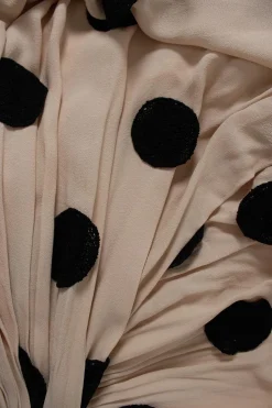Jacquemus asymmetric skirt, in sand color with round circle embroidered and fringes