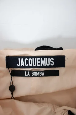 Jacquemus asymmetric skirt, in sand color with round circle embroidered and fringes
