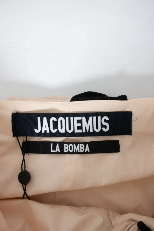 Jacquemus asymmetric skirt, in sand color with round circle embroidered and fringes