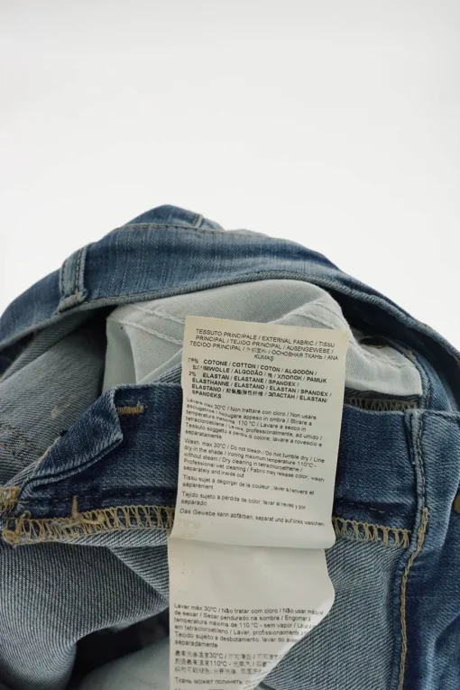 Jeans washed indigo distressed cotton-blend denim low-rise shorts with turn-up cuffs