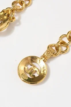 24-karat gold-plated metal Coco Mark medallion charm station chain belt with hook fastening