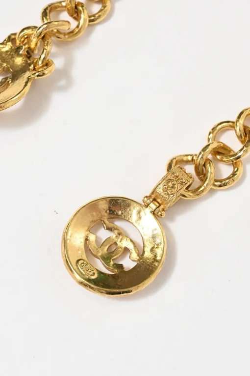 24-karat gold-plated metal Coco Mark medallion charm station chain belt with hook fastening