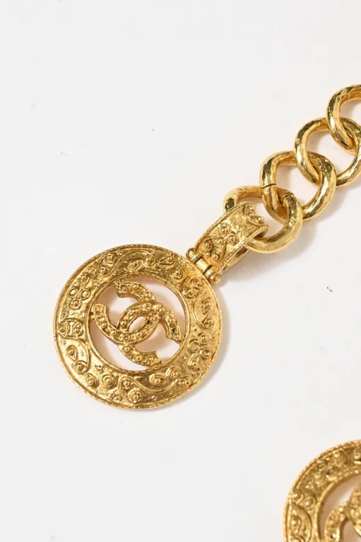 24-karat gold-plated metal Coco Mark medallion charm station chain belt with hook fastening