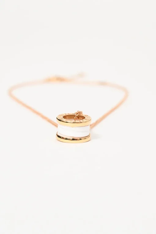 18-karat rose gold and white ceramic B.ZERO1 solitaire pendant necklace with lobster clasp closure
