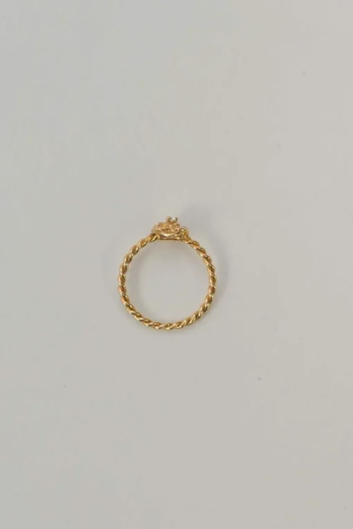 18-karat rose gold signature Piaget Rose ring with pavé-set brilliant cut 0.03 ct diamond