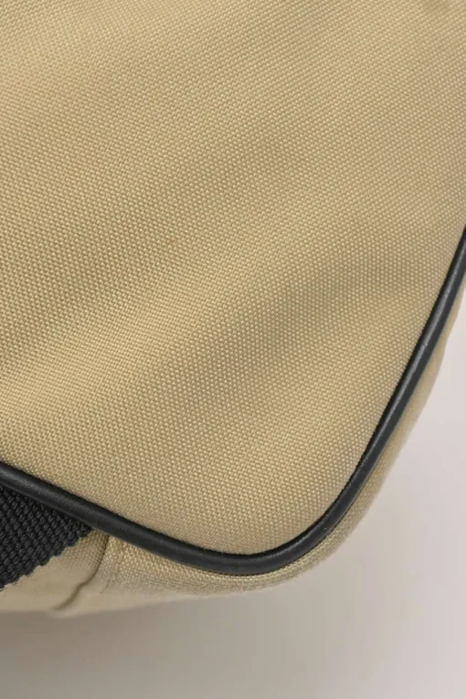 Khaki and black canvas and leather City backpack
