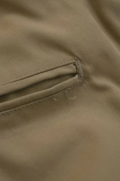 Khaki cotton gabardine pull-on pleat-front tailored trousers with belt tab cuffs