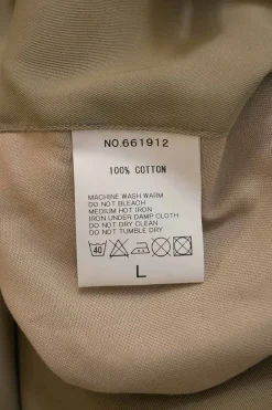 Khaki cotton gabardine pull-on pleat-front tailored trousers with belt tab cuffs