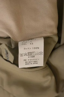 Khaki cotton gabardine pull-on pleat-front tailored trousers with belt tab cuffs