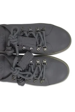 Light grey leather sneakers with metal hoops