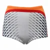 Light grey polyamide-blend jacquard knit high-rise mini shorts with orange, red and black geometric details