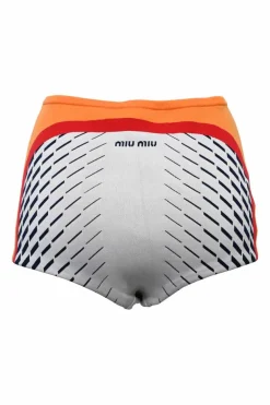 Light grey polyamide-blend jacquard knit high-rise mini shorts with orange, red and black geometric details