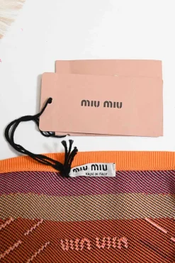 Light grey polyamide-blend jacquard knit high-rise mini shorts with orange, red and black geometric details