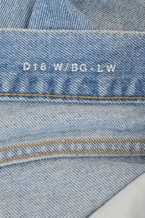 Light-wash indigo cotton denim mid-rise straight-leg distressed jeans