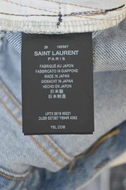 Light-wash indigo cotton denim mid-rise straight-leg distressed jeans