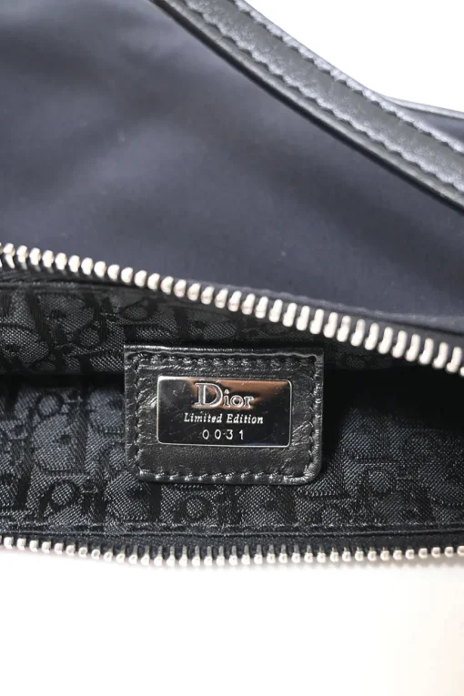 Limited Edition black nylon Saddle Pochette bag with red sequin-embellished floral appliqué