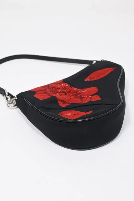Limited Edition black nylon Saddle Pochette bag with red sequin-embellished floral appliqué