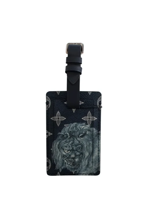 Limited edition Louis Vuitton x Chapman brothers navy monogram luggage tag with lion screen print
