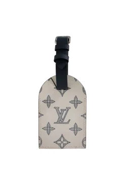 Limited edition Louis Vuitton x Chapman Brothers luggage tag, sold out and very rare. Features Rhino screen print
