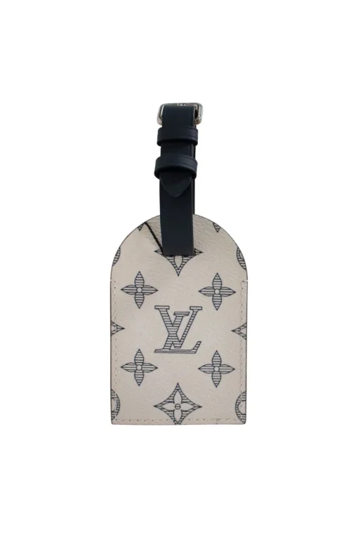 Limited edition Louis Vuitton x Chapman Brothers luggage tag, sold out and very rare. Features Rhino screen print