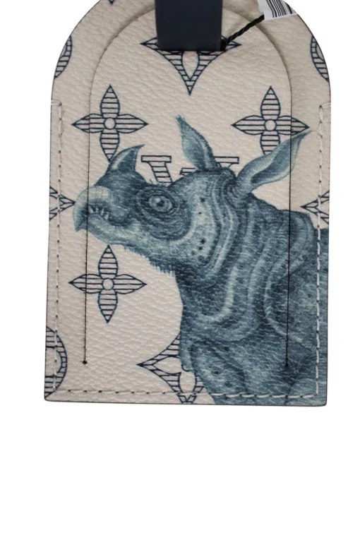 Limited edition Louis Vuitton x Chapman Brothers luggage tag, sold out and very rare. Features Rhino screen print