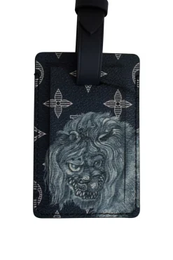 Limited edition Louis Vuitton x Chapman brothers navy monogram luggage tag with lion screen print
