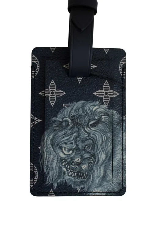 Limited edition Louis Vuitton x Chapman brothers navy monogram luggage tag with lion screen print