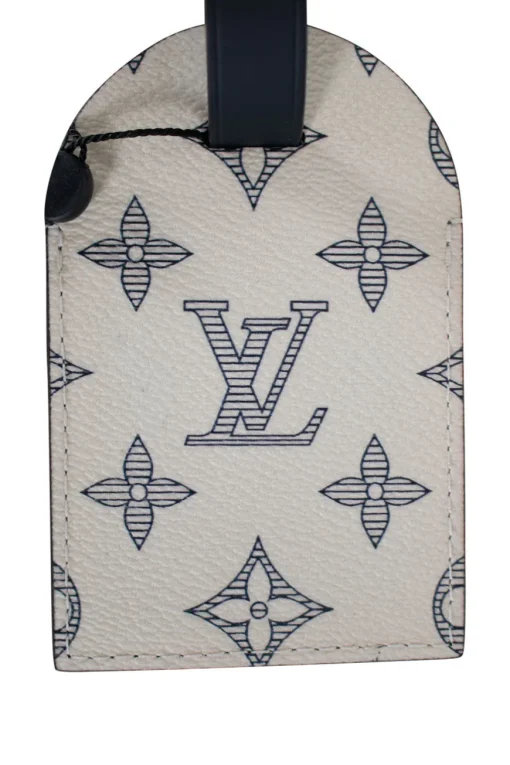 Limited edition Louis Vuitton x Chapman Brothers luggage tag, sold out and very rare. Features Rhino screen print